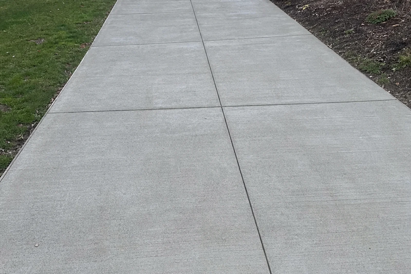 Kirkland Washington hillside driveway concrete King County Eastside grade drainage residential Lake Washington area